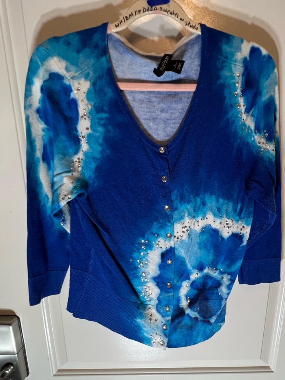 White House Black Market cardigan.
New. Size: L. Price: $49.